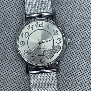 Quartz watch with cute heart accents.